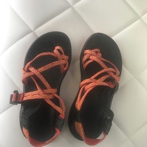 Orange and Black Chacos